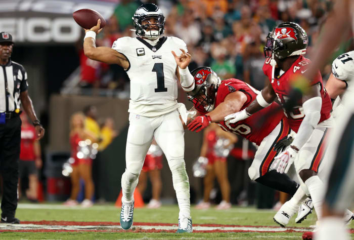 Philadelphia Eagles quarterback Jalen Hurts (1) throws the ball as Tampa Bay Buccaneers defensive tackle Greg Gaines (96) pressures during the first half at Raymond James Stadium. Mandatory Credit: Kim Klement Neitzel-USA TODAY Sports